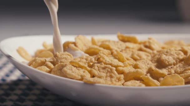 Pouring Milk on Corn Flakes. Slow Motion - Footage, Video