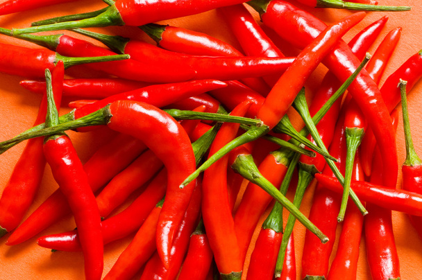 Red chili peppers arranged - Φωτογραφία, εικόνα