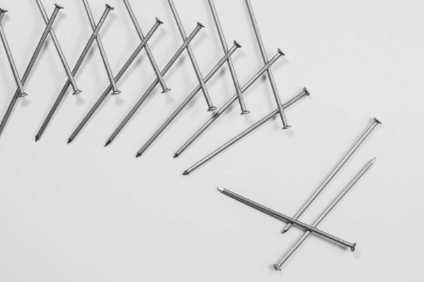 Metal nails isolated on white background. working tools - Photo, image