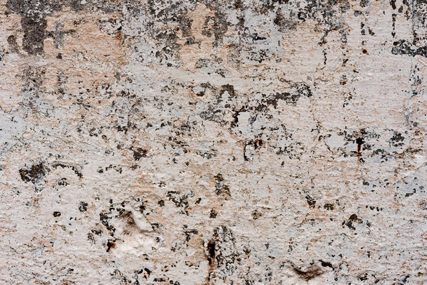 Texture of a concrete wall with cracks and scratches which can be used as a background - Foto, Imagen