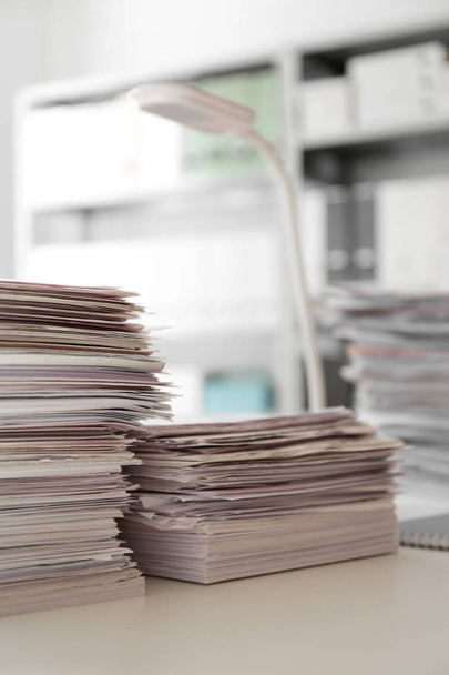 Stacks of documents on desk in office. Space for text - Foto, imagen