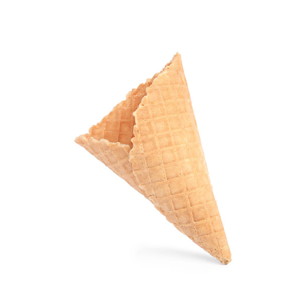 Empty wafer ice cream cone on white background - Fotoğraf, Görsel