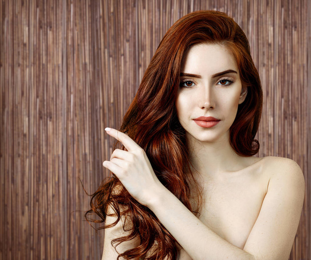 Beauty portrait of redhead woman with perfect skin. - Photo, Image