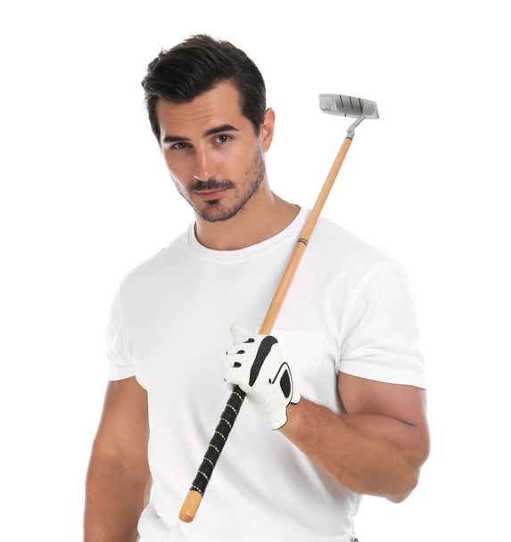 Young man posing with golf club on white background - Foto, Imagen