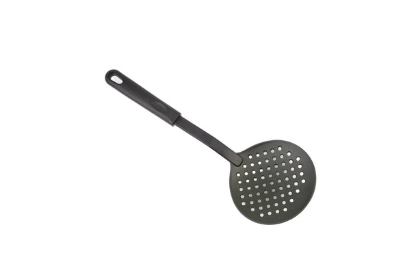 Black kitchen spatula utensils or kitchenware closeup isolated on white background - Photo, Image