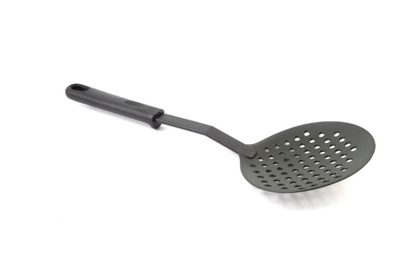 Чорний кухонний шпатель або посуд крупним планом ізольовані на білому тлі
 - Фото, зображення