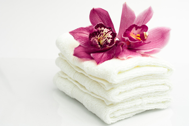 Fiori e asciugamani
 - Foto, immagini
