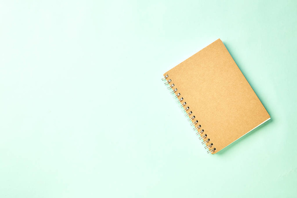 Notebook with pencil on pastel office desk - Foto, Imagem