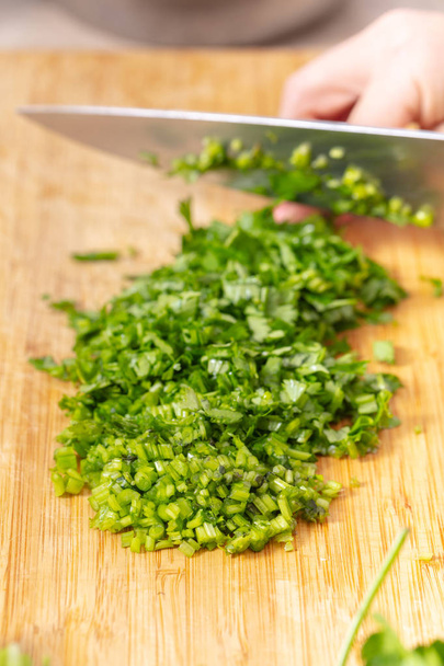 Cook chopped green coriander  - Fotó, kép