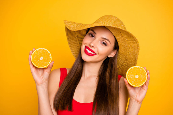 Close up photo of amazing lady bright lips nice colorful look orange slices hands trip fresh cocktail wear sun hat red swimming suit isolated yellow background - Foto, Imagem