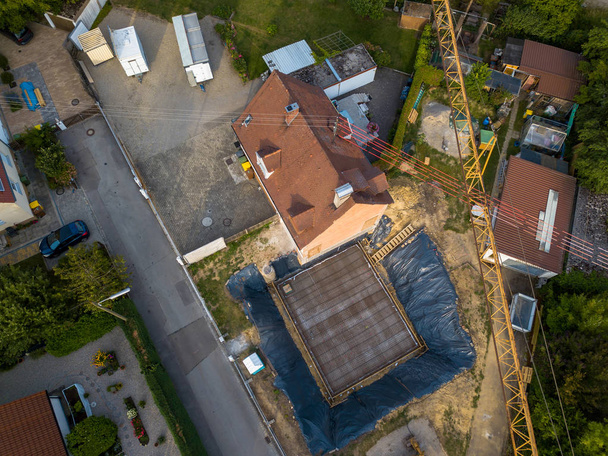 Aerial view of a construction site within a village in Germany. - Photo, Image