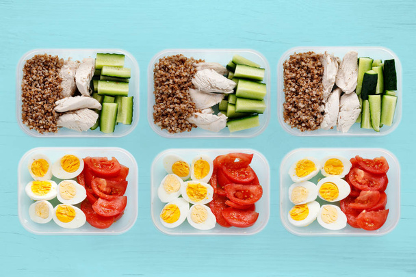 Healthy fitness food for the whole day. Multiple portions in containers - Photo, image