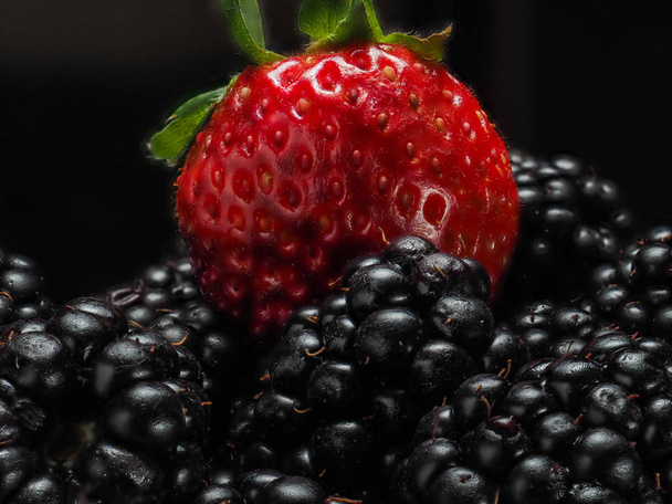 Close-up view of mixed, assorted berries blackberry, strawberry, background. Colorful and healthy concept. - Foto, Bild