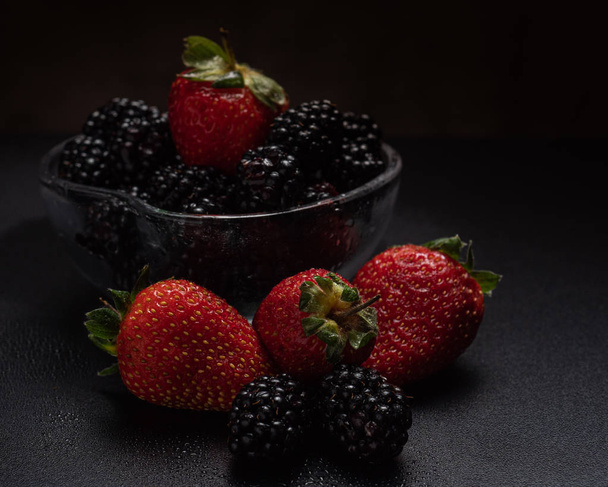 Close-up view of mixed, assorted berries blackberry, strawberry, background. Colorful and healthy concept. - Foto, Bild