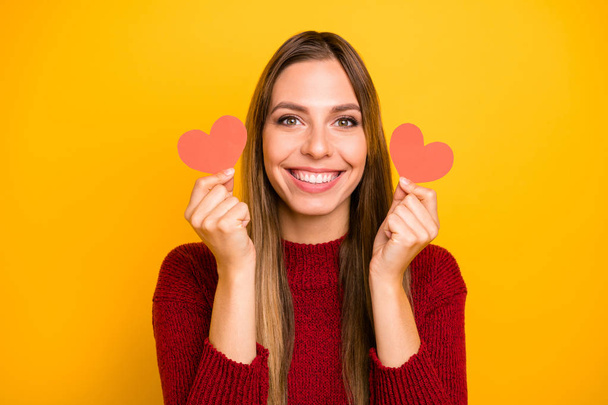 Closeup photo of pretty lady holding arms little heart figured postcards wear pullover isolated yellow background - Valokuva, kuva