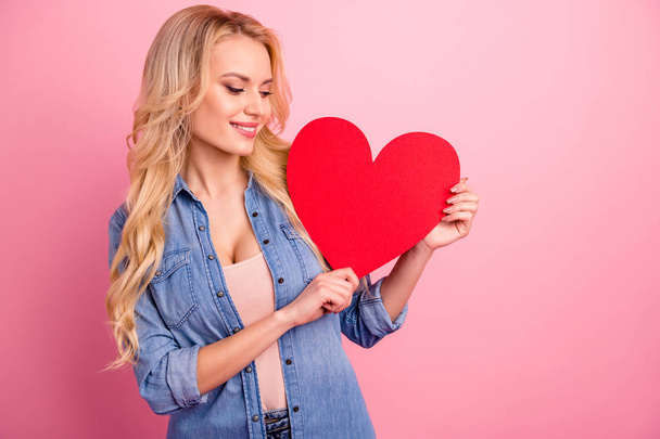 Photo of pretty lady holding large paper heart hands wear denim outfit isolated pink background - Photo, image