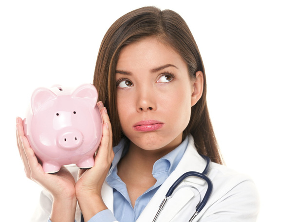 Health care concept - expensive medical insurance - 写真・画像