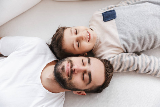 Top view of a smiling father and his son - Foto, Imagen