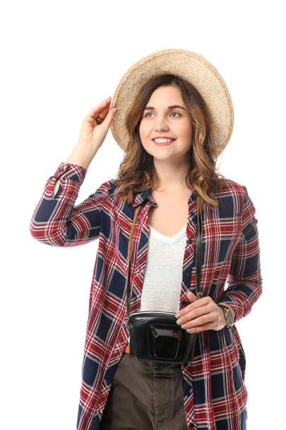 Female tourist with photo camera on white background - Foto, afbeelding