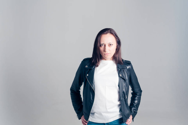 Portrait of a woman in a leather jacket - Photo, Image