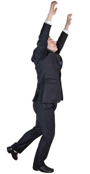Handsome man in formal suit on white background. Abstract photo of business emotions. - 写真・画像