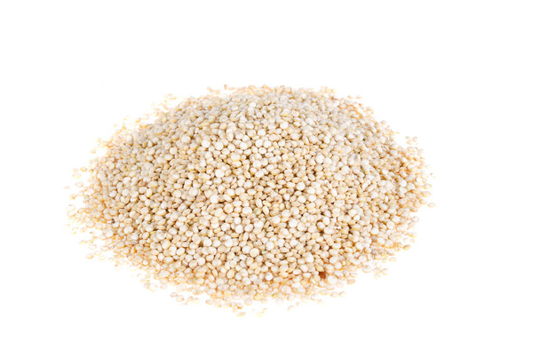 Quinoa seeds on a white background. Proper nutrition, healthy health products. - Photo, Image