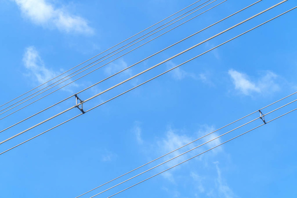 Wires power high and blue sky background. - Photo, Image