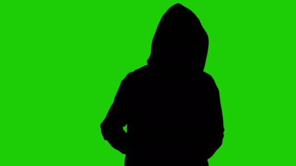 Drugshandelaren silhouet op groene achtergrond - Video