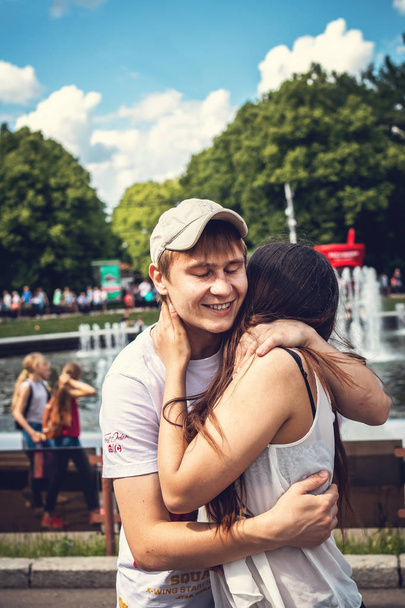 MOSCOW, RUSSIA - JUNE 2, 2019: Young romantic couple in the Sokolniki park. - Photo, image