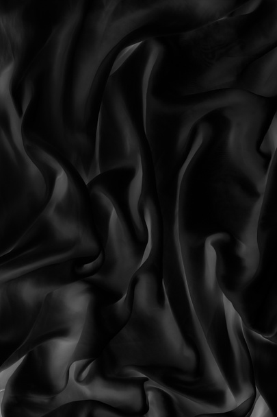 Luxury black soft silk flatlay background texture, holiday glamo - Foto, Imagem