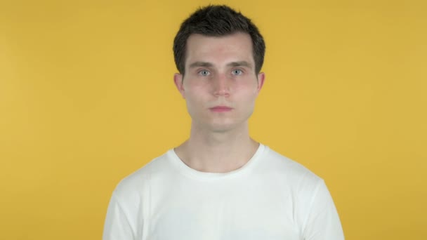 Happy Young Man Isolated on Yellow Background - Video