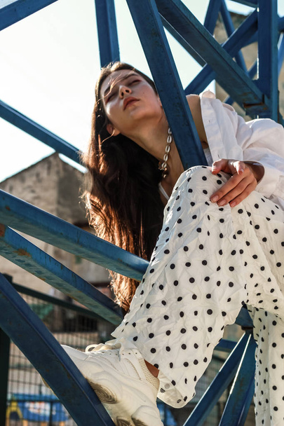 Young beautiful lady wearing a stylish white top.Portrait shooti - Valokuva, kuva