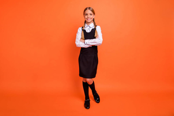 Full length body size view of her she nice attractive lovely charming cheerful cheery content pre-teen girl folded arms isolated over bright vivid shine orange background - Zdjęcie, obraz