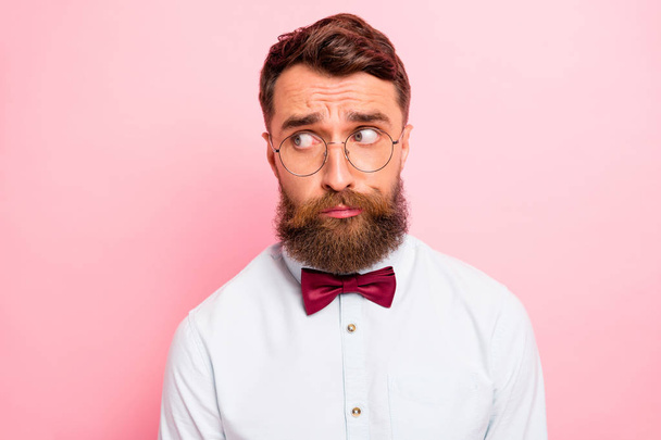 Close-up photo of uncertain unsure modest geek person wearing formal clothing does not know what to do looking aside isolated pastel background - Zdjęcie, obraz