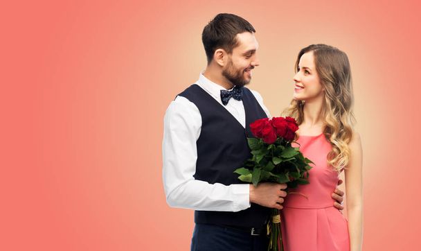 couple with bunch of flowers on valentines day - Foto, Bild