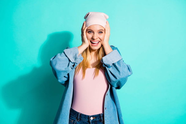 Portrait of her she nice-looking attractive lovely sweet charming cute cheerful cheery glad amazed girl wearing streetstyle clothing isolated over bright vivid shine blue green turquoise background - Zdjęcie, obraz
