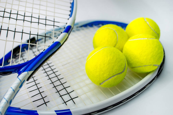 tennis ball and racket on white background - Fotó, kép