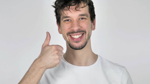 Portret van gelukkig Casual jongeman gebaren Thumbs Up - Foto, afbeelding