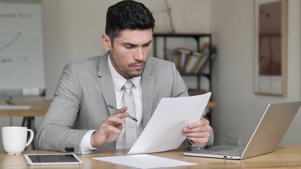 Businessman Reading Documents, Contract - Фото, изображение