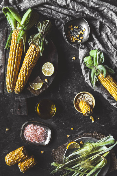 Grilled corn cobs with sauce, coriande. Mexican food. Top view. Copy space, healthy food, vegetables - Zdjęcie, obraz