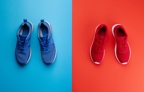 A studio shot of running shoes on bright color background. Flat lay. - 写真・画像