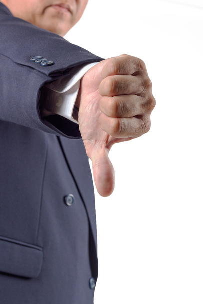hand duim naar beneden door zakenman. afwijzing symbool - Foto, afbeelding