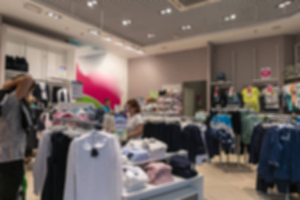Interior clothing store. Blurred background - Photo, Image