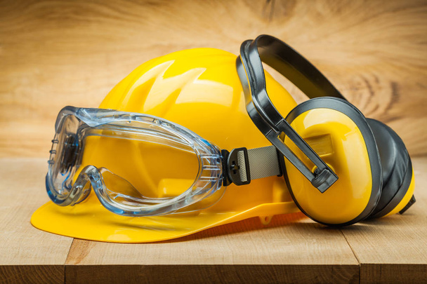 safety of work. construction safety tools. yellow helmet blue go - Φωτογραφία, εικόνα
