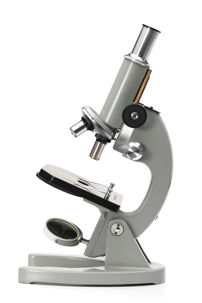 Old microscope isolated on white background - Фото, изображение