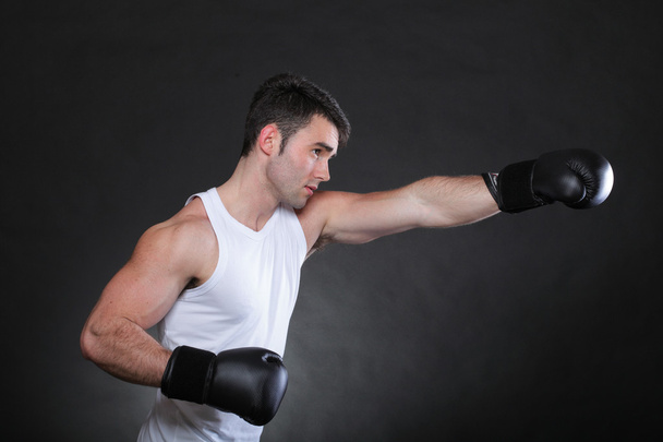 Portrait sportsman boxer in studio dark background - Fotoğraf, Görsel