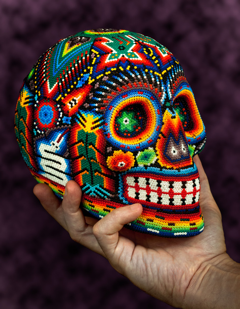 Colorful Beaded Skull on Hand - Photo, Image
