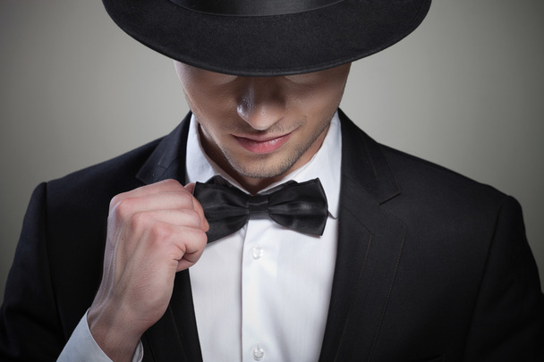 Stylish man in elegant black suit - Photo, image