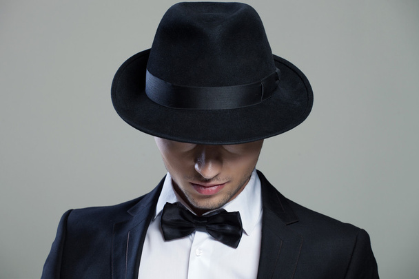 Stylish man in elegant black suit - Photo, Image