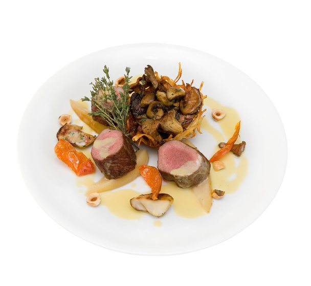 Roasted fillet of deer with assorted wild mushrooms - Photo, Image